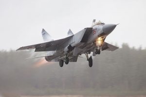 На маршах, на позициях, в учебных атаках