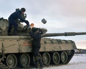 Вторым эшелоном.