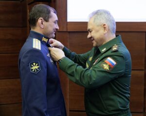 Отважно сражаясь за наше священное дело.